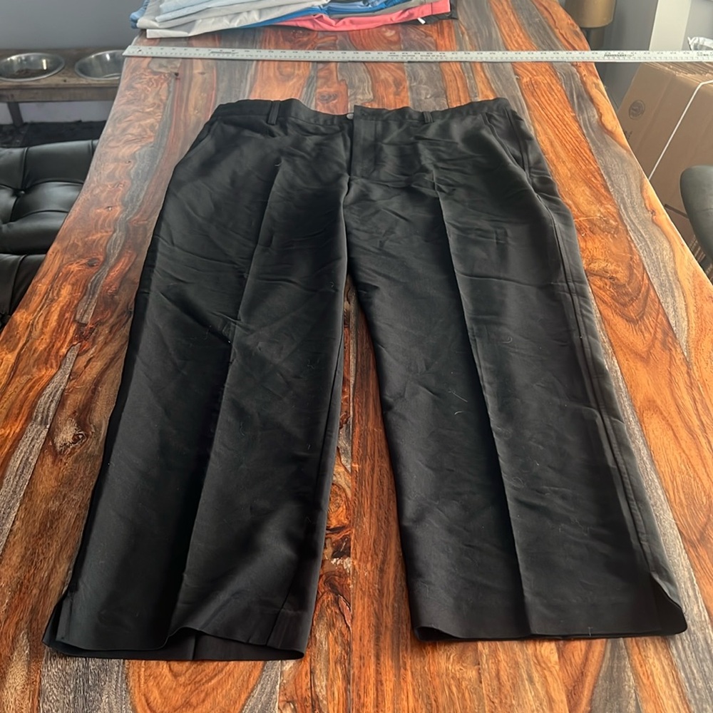 Men’s black FootJoy golf pants. 42x32